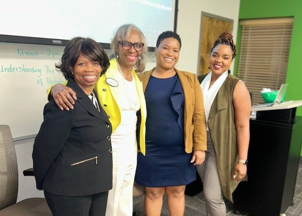 Jacqlene Monét taking picture with other event invitees